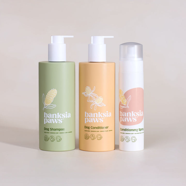 Classic Bundle - Three bottles of banksia paws pet care products on a beige background