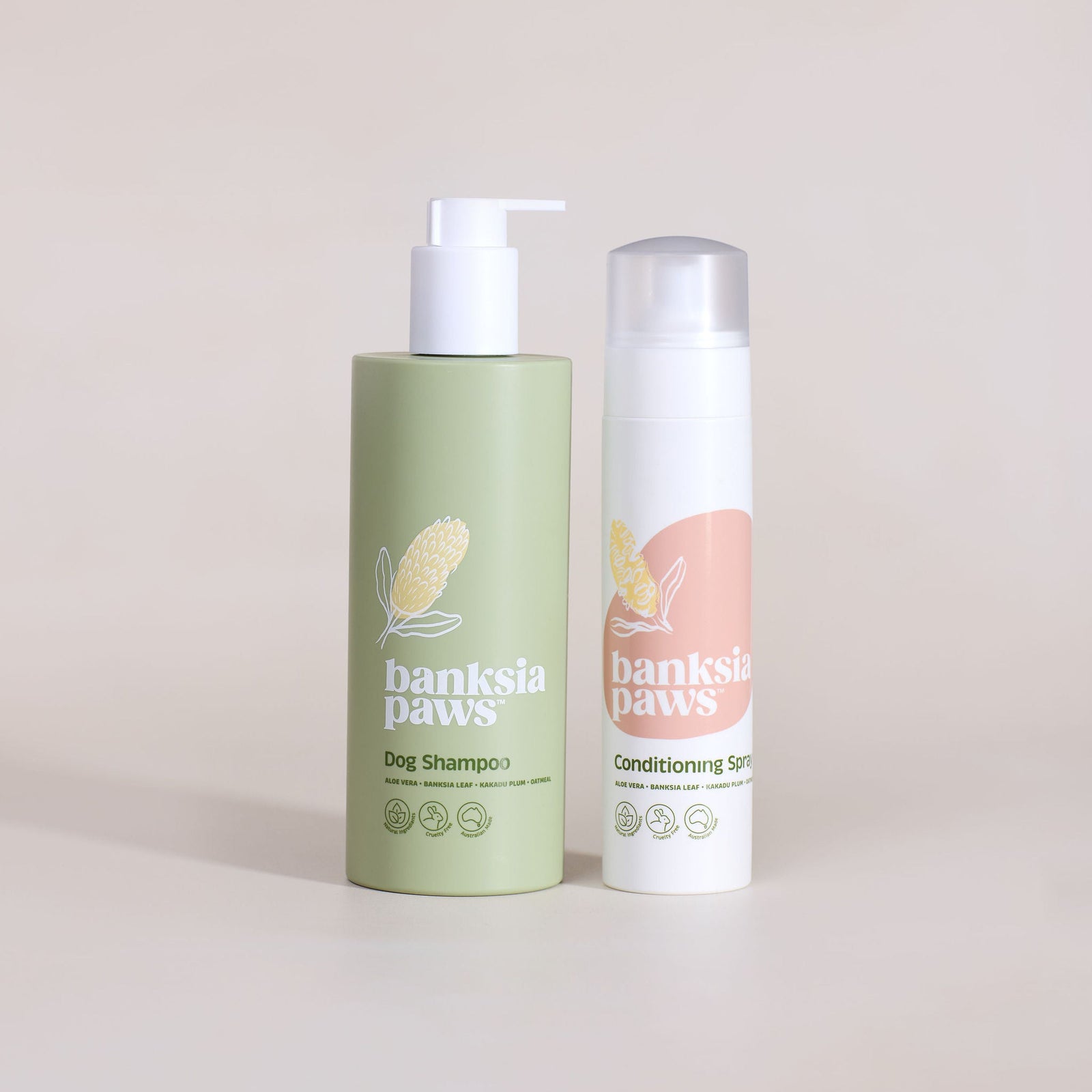 Two bottles of banksia paws pet care products on a beige background