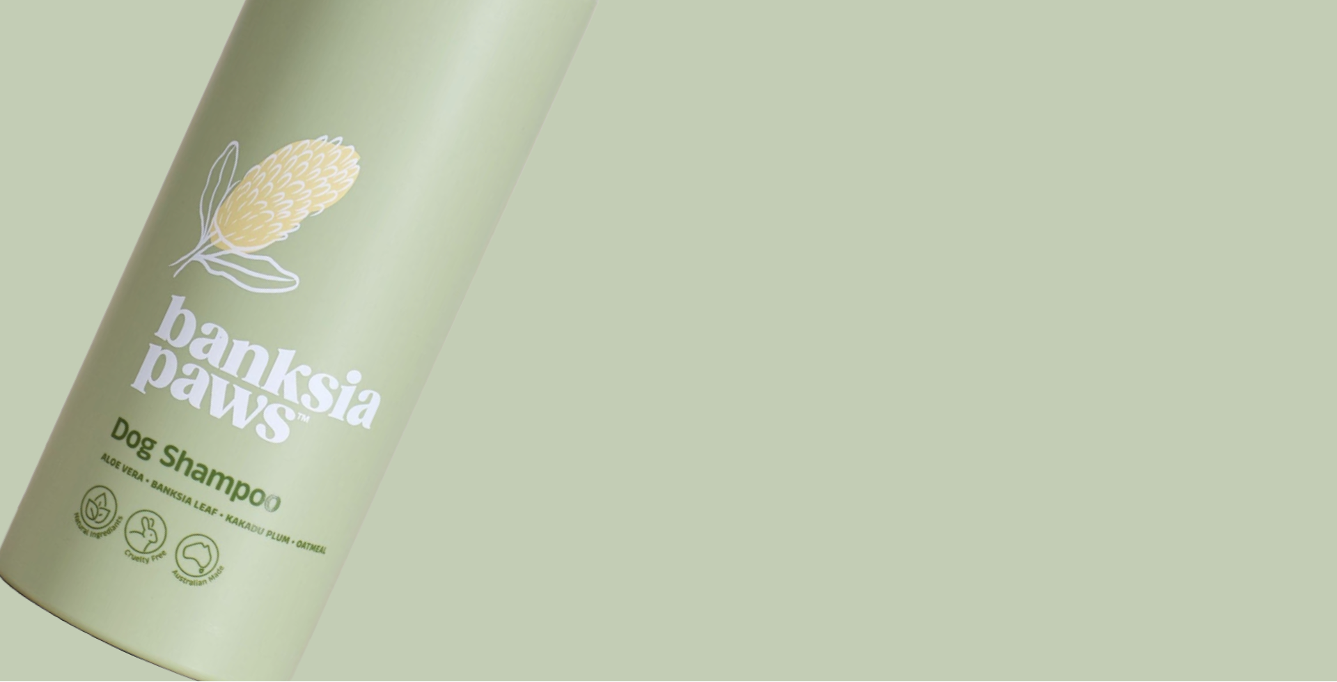 Banksia Paws dog shampoo bottle on a light green background